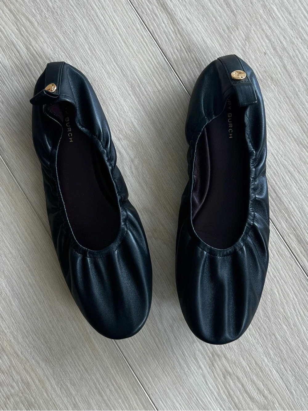 Tory Burch “Eddie” Black Ballet Flats with Gold Logo Button